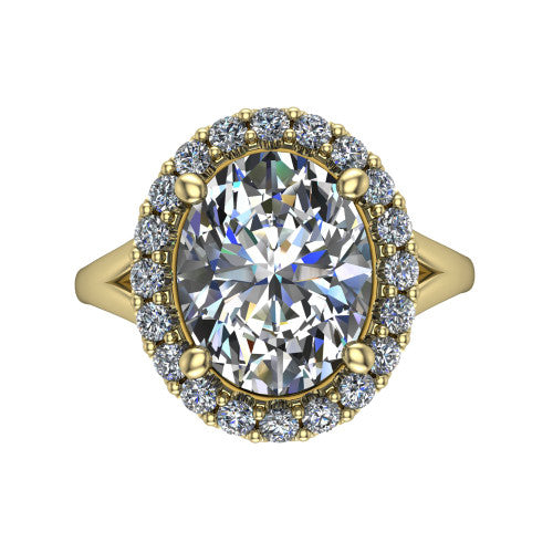 Seraphina oval halo engagement ring in 18K Yellow Gold, top-down view showing the center diamond framed by a pav&eacute; halo where the split shank meets the head