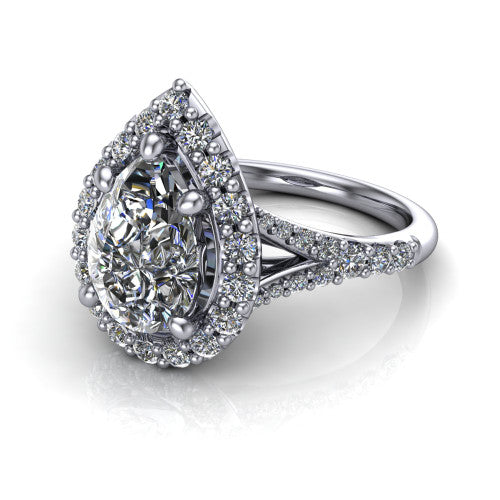 Sadie pear halo engagement ring in 14K White Gold, three-quarter perspective showing the milgrain-edged haloed center raised above a pav&eacute; split shank