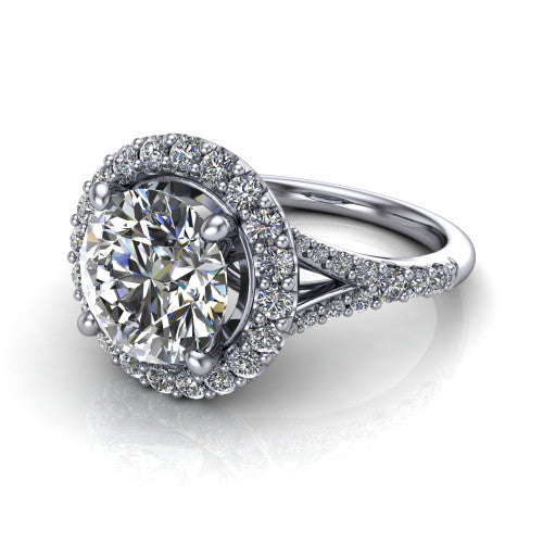 Sadie round halo engagement ring in 18K White Gold, three-quarter perspective showing the milgrain-edged haloed center raised above a pav&eacute; split shank