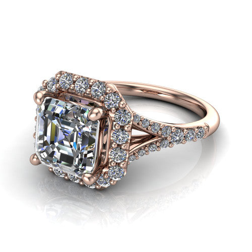 Sadie asscher halo engagement ring in 18K Rose Gold, three-quarter perspective showing the milgrain-edged haloed center raised above a pav&eacute; split shank