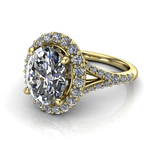 Sadie oval halo engagement ring in 14K Yellow Gold, three-quarter perspective showing the milgrain-edged haloed center raised above a pav&eacute; split shank