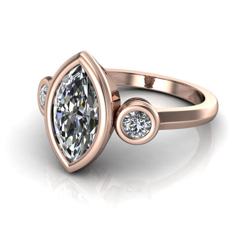 Daisy marquise three stone engagement ring in 14K Rose Gold, three-quarter perspective showing the bezel-set center between two bezel-set round side stones on a slim polished band