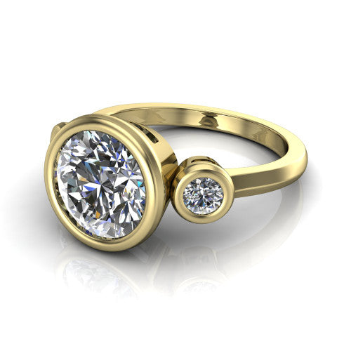 Daisy round three stone engagement ring in 18K Yellow Gold, three-quarter perspective showing the bezel-set center between two bezel-set round side stones on a slim polished band
