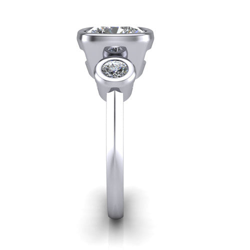 Daisy cushion three stone engagement ring in 14K White Gold, side profile showing the bezel-set round side stone and the smooth polished band