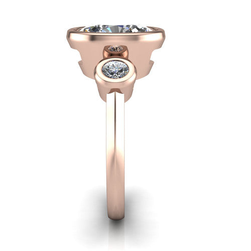 Daisy oval three stone engagement ring in 14K Rose Gold, side profile showing the bezel-set round side stone and the smooth polished band
