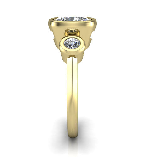 Daisy cushion three stone engagement ring in 14K Yellow Gold, side profile showing the bezel-set round side stone and the smooth polished band