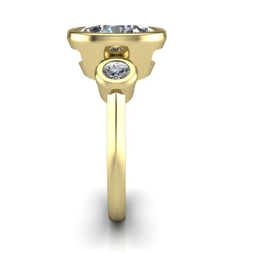 Daisy oval three stone engagement ring in 14K Yellow Gold, side profile showing the bezel-set round side stone and the smooth polished band