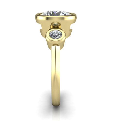 Daisy round three stone engagement ring in 14K Yellow Gold, side profile showing the bezel-set round side stone and the smooth polished band