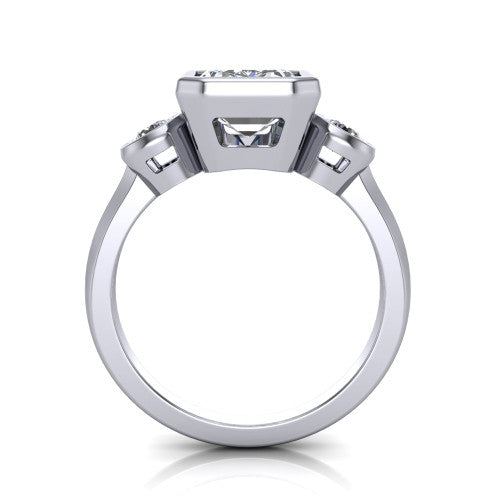 Daisy emerald three stone engagement ring in Platinum, through-finger front profile showing the three-stone bezel head raised above the slim polished shank