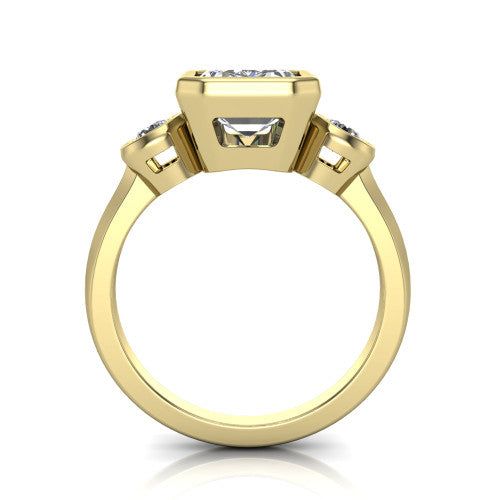 Daisy emerald three stone engagement ring in 18K Yellow Gold, through-finger front profile showing the three-stone bezel head raised above the slim polished shank