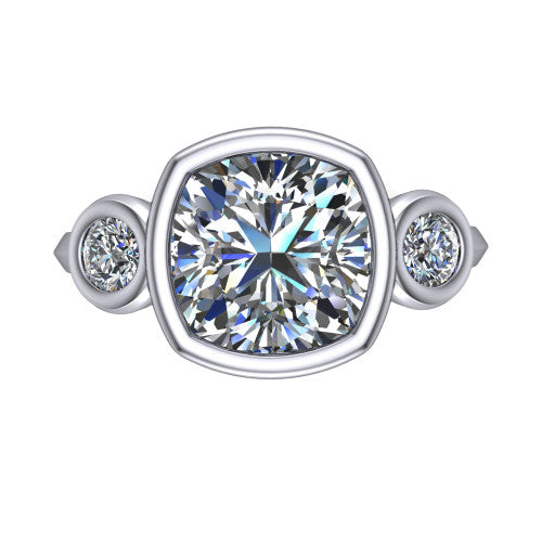 Daisy cushion three stone engagement ring in 14K White Gold, top-down view showing the bezel-set center diamond flanked by two round bezel-set side stones
