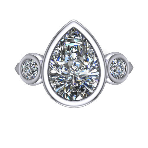 Daisy pear three stone engagement ring in 18K White Gold, top-down view showing the bezel-set center diamond flanked by two round bezel-set side stones