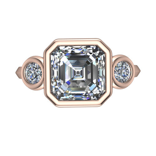 Daisy asscher three stone engagement ring in 18K Rose Gold, top-down view showing the bezel-set center diamond flanked by two round bezel-set side stones
