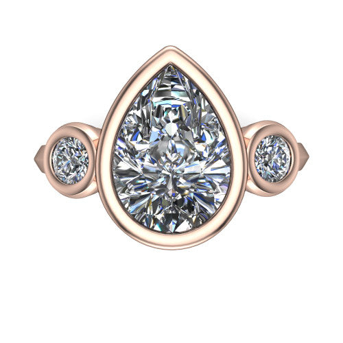 Daisy pear three stone engagement ring in 14K Rose Gold, top-down view showing the bezel-set center diamond flanked by two round bezel-set side stones