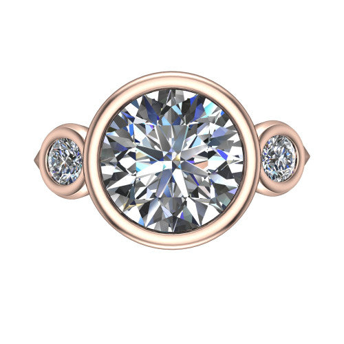 Daisy round three stone engagement ring in 18K Rose Gold, top-down view showing the bezel-set center diamond flanked by two round bezel-set side stones
