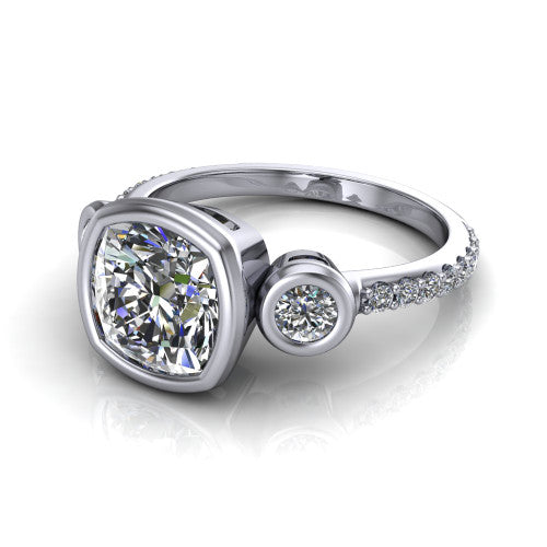 Chloe cushion three stone engagement ring in 18K White Gold, three-quarter perspective showing the bezel-set center between two bezel-set round side stones above a pav&eacute; shank