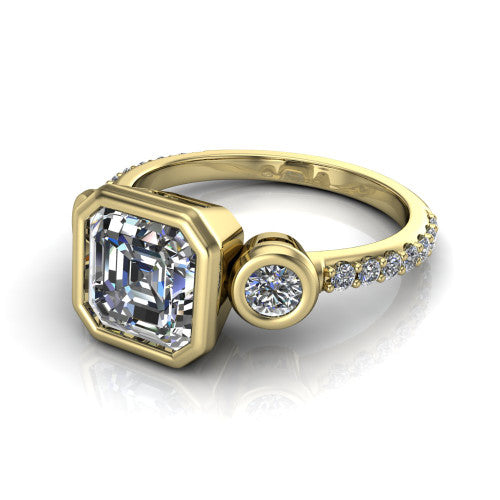 Chloe asscher three stone engagement ring in 14K Yellow Gold, three-quarter perspective showing the bezel-set center between two bezel-set round side stones above a pav&eacute; shank