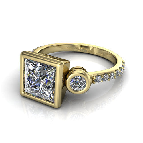 Chloe princess three stone engagement ring in 14K Yellow Gold, three-quarter perspective showing the bezel-set center between two bezel-set round side stones above a pav&eacute; shank