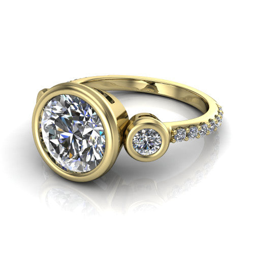 Chloe round three stone engagement ring in 14K Yellow Gold, three-quarter perspective showing the bezel-set center between two bezel-set round side stones above a pav&eacute; shank