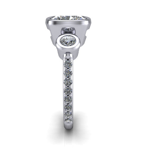 Chloe cushion three stone engagement ring in 14K White Gold, side profile showing the round bezel side stone and the pav&eacute; diamonds running down the shank