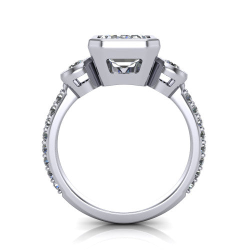 Chloe emerald three stone engagement ring in Platinum, through-finger front profile showing the three-stone bezel head raised above the pav&eacute; band