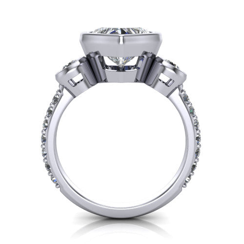 Chloe heart three stone engagement ring in Platinum, through-finger front profile showing the three-stone bezel head raised above the pav&eacute; band