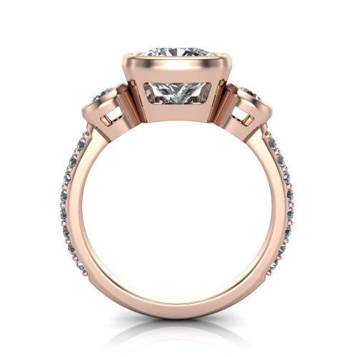 Chloe cushion three stone engagement ring in 14K Rose Gold, through-finger front profile showing the three-stone bezel head raised above the pav&eacute; band