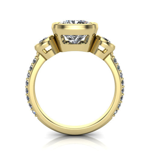 Chloe cushion three stone engagement ring in 18K Yellow Gold, through-finger front profile showing the three-stone bezel head raised above the pav&eacute; band