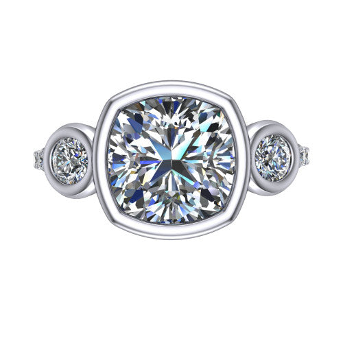 Chloe cushion three stone engagement ring in 14K White Gold, top-down view showing the bezel-set center flanked by two round side stones in bezels over a pav&eacute; band