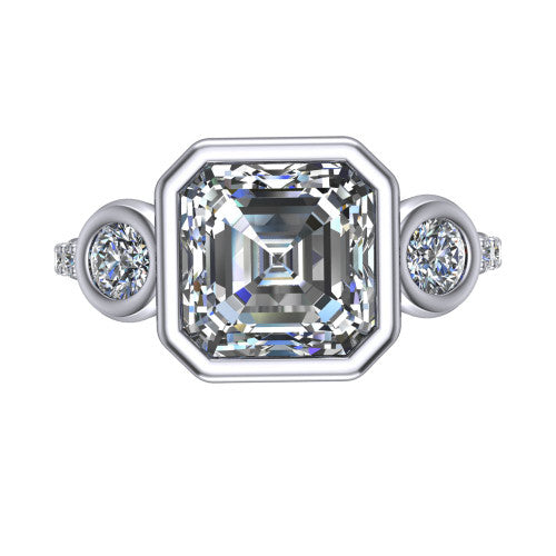Chloe asscher three stone engagement ring in 18K White Gold, top-down view showing the bezel-set center flanked by two round side stones in bezels over a pav&eacute; band