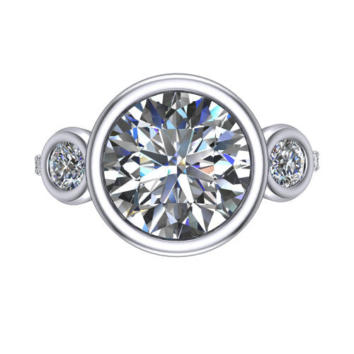 Chloe round three stone engagement ring in 14K White Gold, top-down view showing the bezel-set center flanked by two round side stones in bezels over a pav&eacute; band