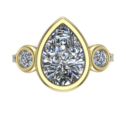 Chloe pear three stone engagement ring in 18K Yellow Gold, top-down view showing the bezel-set center flanked by two round side stones in bezels over a pav&eacute; band