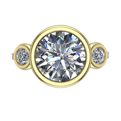 Chloe round three stone engagement ring in 14K Yellow Gold, top-down view showing the bezel-set center flanked by two round side stones in bezels over a pav&eacute; band