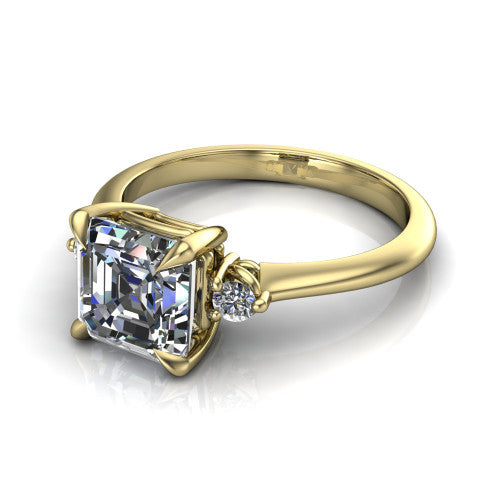 Olive asscher three stone engagement ring in 14K Yellow Gold, three-quarter perspective showing the center diamond between two round side stones on a slim polished band