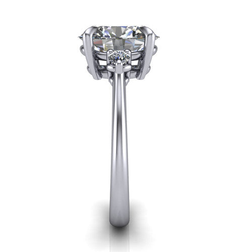 Olive oval three stone engagement ring in 18K White Gold, side profile showing the round side stone and the smooth tapered polished band