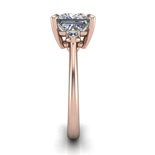 Olive princess three stone engagement ring in 14K Rose Gold, side profile showing the round side stone and the smooth tapered polished band