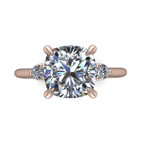 Olive cushion three stone engagement ring in 18K Rose Gold, through-finger front profile showing the three-stone head raised above the slim polished shank and trellis gallery