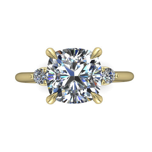 Olive cushion three stone engagement ring in 14K Yellow Gold, top-down view showing the center diamond flanked by two round side stones in a classic three stone setting