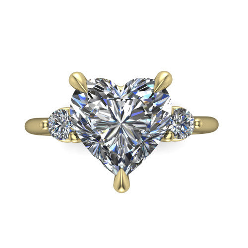Olive heart three stone engagement ring in 14K Yellow Gold, top-down view showing the center diamond flanked by two round side stones in a classic three stone setting