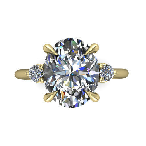 Olive oval three stone engagement ring in 14K Yellow Gold, top-down view showing the center diamond flanked by two round side stones in a classic three stone setting