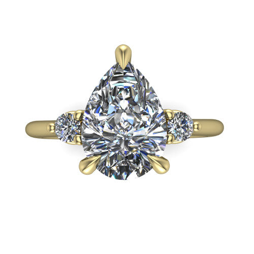 Olive pear three stone engagement ring in 14K Yellow Gold, top-down view showing the center diamond flanked by two round side stones in a classic three stone setting