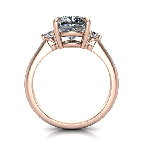 Olive cushion three stone engagement ring in 14K Rose Gold, top-down view showing the center diamond flanked by two round side stones in a classic three stone setting