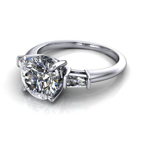 Jade round three stone engagement ring in 18K White Gold with tapered baguette side stones, three-quarter perspective view