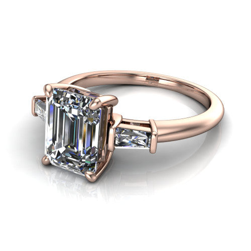Jade emerald three stone engagement ring in 18K Rose Gold with tapered baguette side stones, three-quarter perspective view