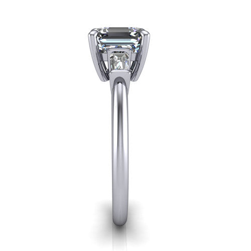 Jade asscher three stone engagement ring in 18K White Gold with tapered baguette side stones, side profile showing the plain band and bar-set baguette