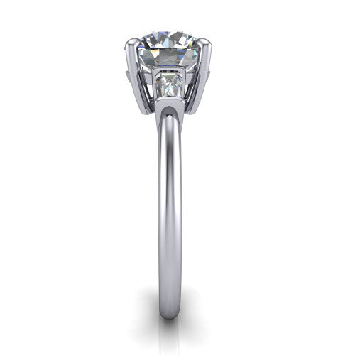 Jade round three stone engagement ring in Platinum with tapered baguette side stones, side profile showing the plain band and bar-set baguette