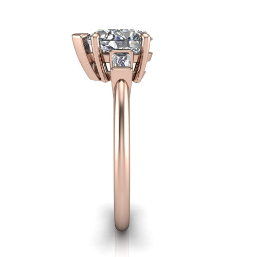 Jade pear three stone engagement ring in 14K Rose Gold with tapered baguette side stones, side profile showing the plain band and bar-set baguette