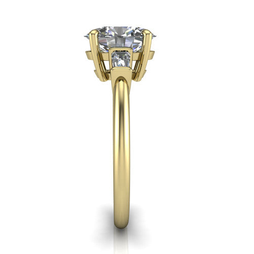 Jade oval three stone engagement ring in 18K Yellow Gold with tapered baguette side stones, side profile showing the plain band and bar-set baguette