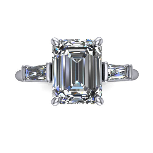 Jade emerald three stone engagement ring in 18K White Gold with tapered baguette side stones, top-down view of the center stone and tapered baguette side stones