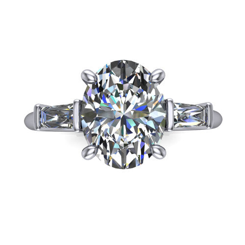 Jade oval three stone engagement ring in 14K White Gold with tapered baguette side stones, top-down view of the center stone and tapered baguette side stones